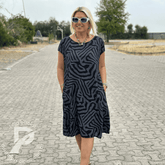 Vestido Feminino Luara - Modelagem Solta com Estampa Animal Print e Bolsos Laterais